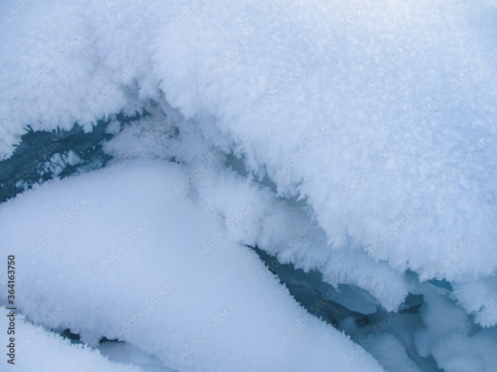 Winter background. The texture of the snow Winter background. The texture of the snow