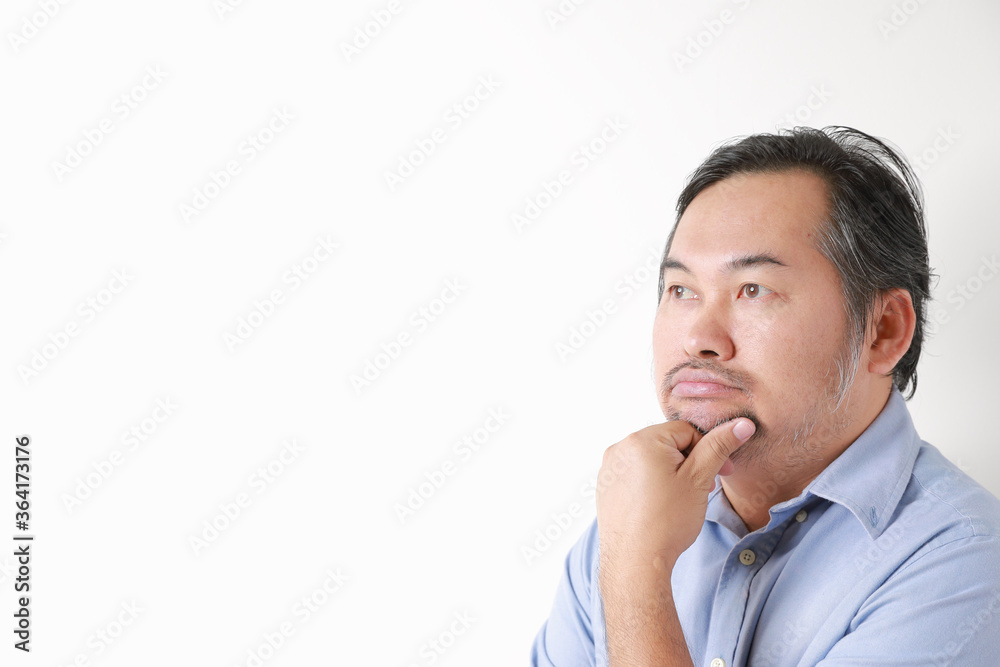 Portrait asian man caucasian have beard wearing shirt blue. Thinking about things over white background.