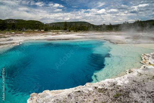 Sapphire Pool, located in Biscuit Basin, in Yellowstone National Park is a geothermal hot spring feature