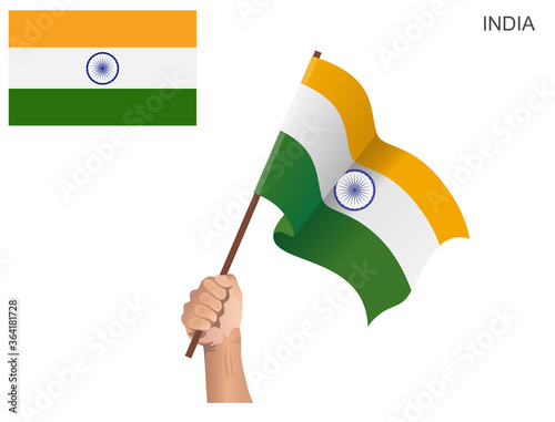 Indian state flag hoisted with a stick held by hand to inflame the spirit of statehood