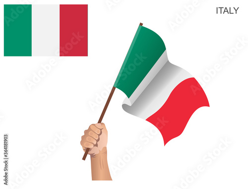 Italian state flag hoisted with a stick held by hand to inflame the spirit of statehood
