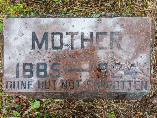 Closeup of grave inscribed with "Mother"