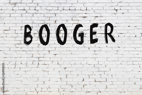 Tableau sur toile Inscription booger painted on white brick wall