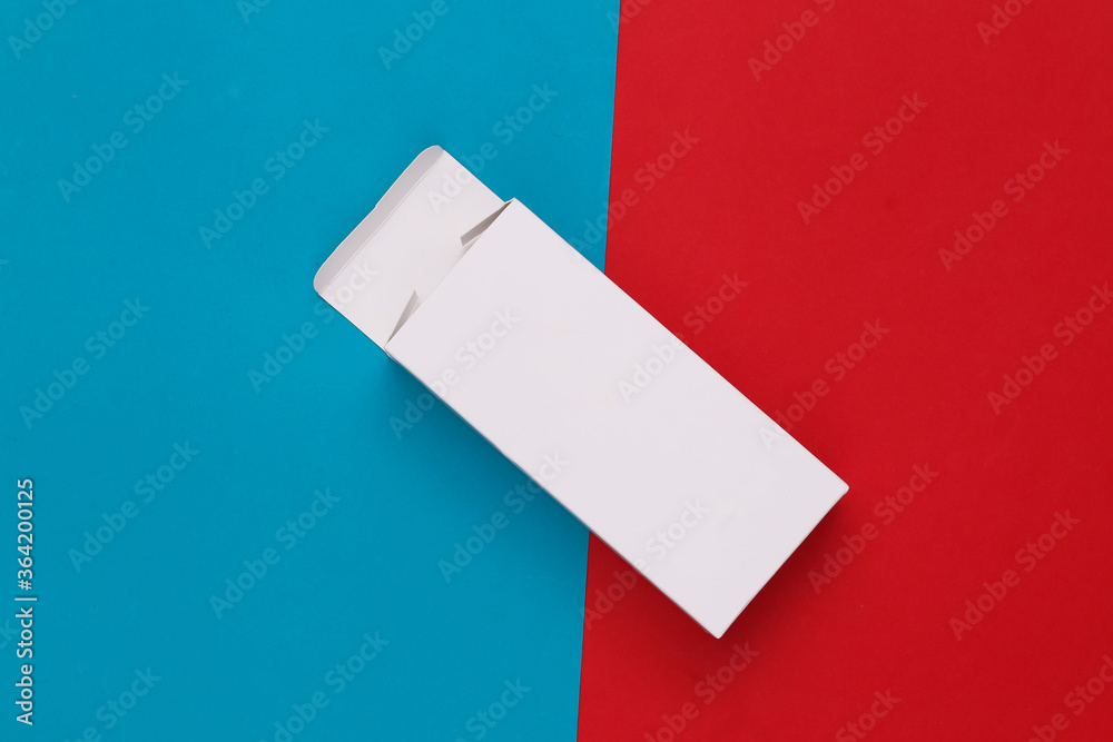 Open White packing box on red blue background. Minimalism. Top view Open White packing box on red blue background. Minimalism. Top view