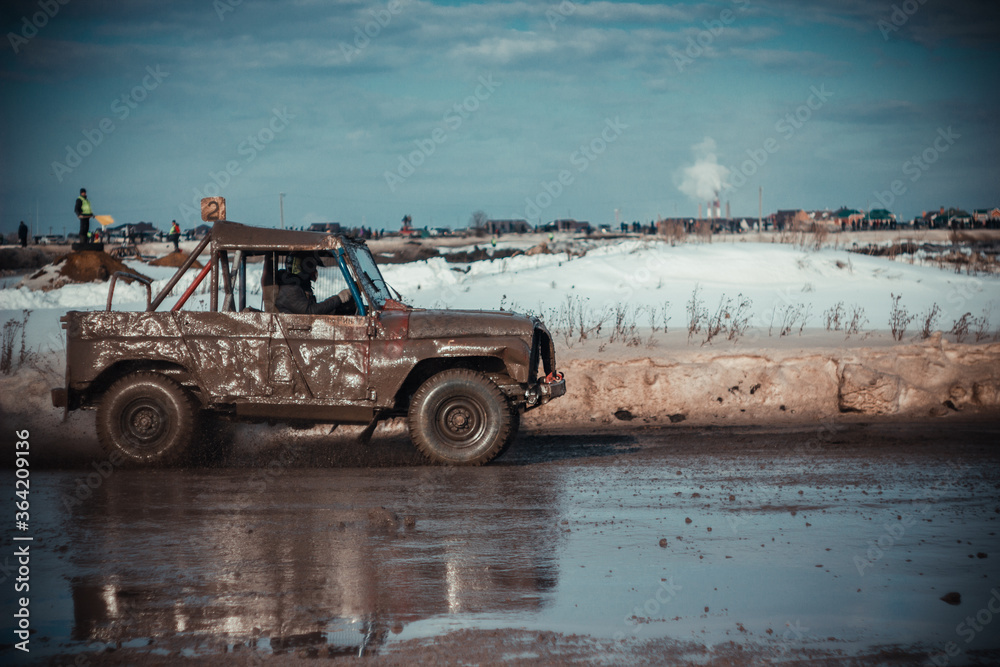 Dirty race cars ride off-road at competitions Dirty race cars ride off-road at competitions