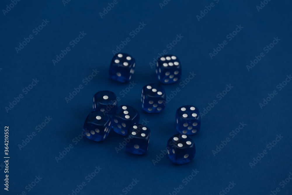Dice on a classic blue background. Luck, gaming addiction Dice on a classic blue background. Luck, gaming addiction