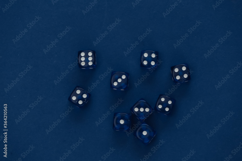 Dice on a classic blue background. Luck, gaming addiction Dice on a classic blue background. Luck, gaming addiction