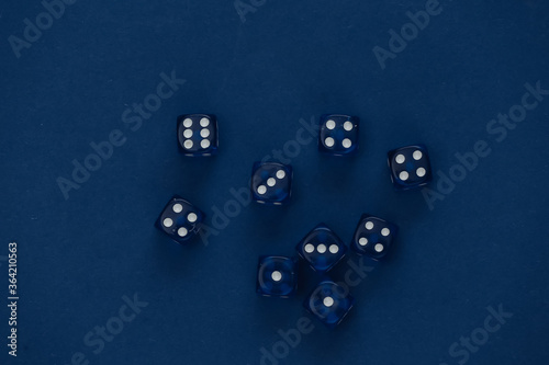 Dice on a classic blue background. Luck, gaming addiction
