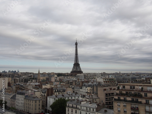 Paris skyline and Eiffel Tower on a cloudy day with thick clouds. © ponkichi9