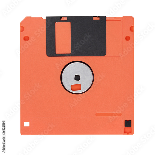 Red 3.5-inch floppy disk or diskette isolated on white