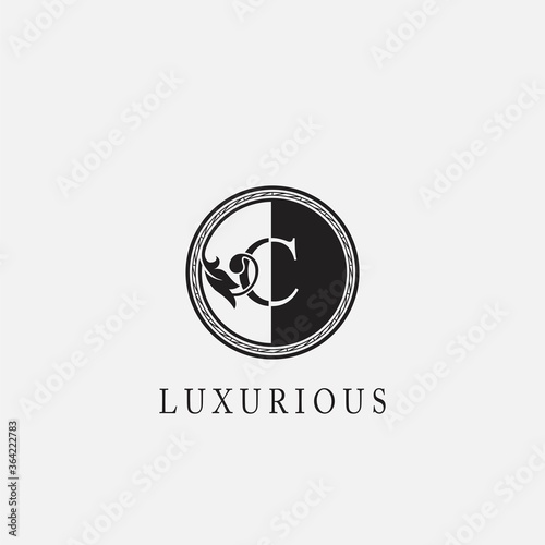 Circle C Letter Logo Icon. Classy Vintage Ornate Leaf Shape design on black and white color for business initial like fashion, jewelry, beauty salon, cosmetics, spa, hotel and restaurant