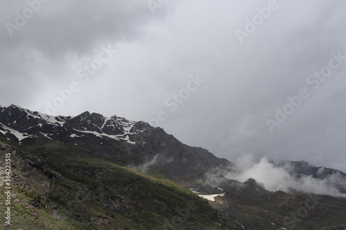 Snow and mist covered mountain