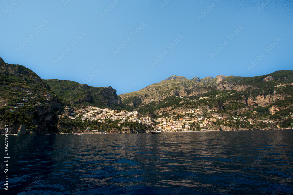 Panoramic view of Positano, Located at the centre of Amalfi coast from the middle of  the sea, Gulf of Naples, South Italy.