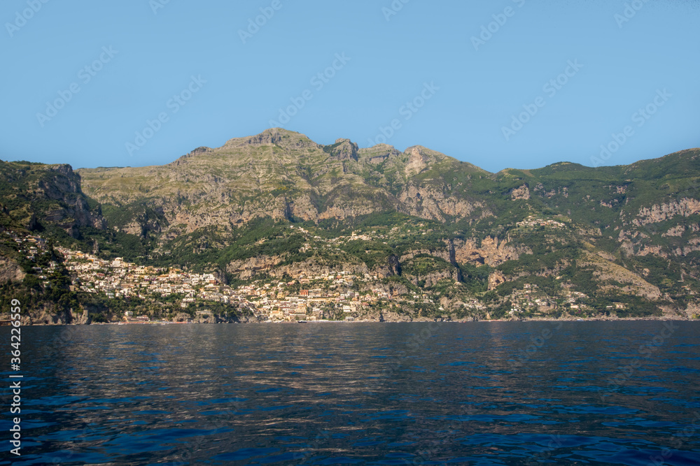 view of positano city from the sea, amazing location in amalfi coast, South of Italy.