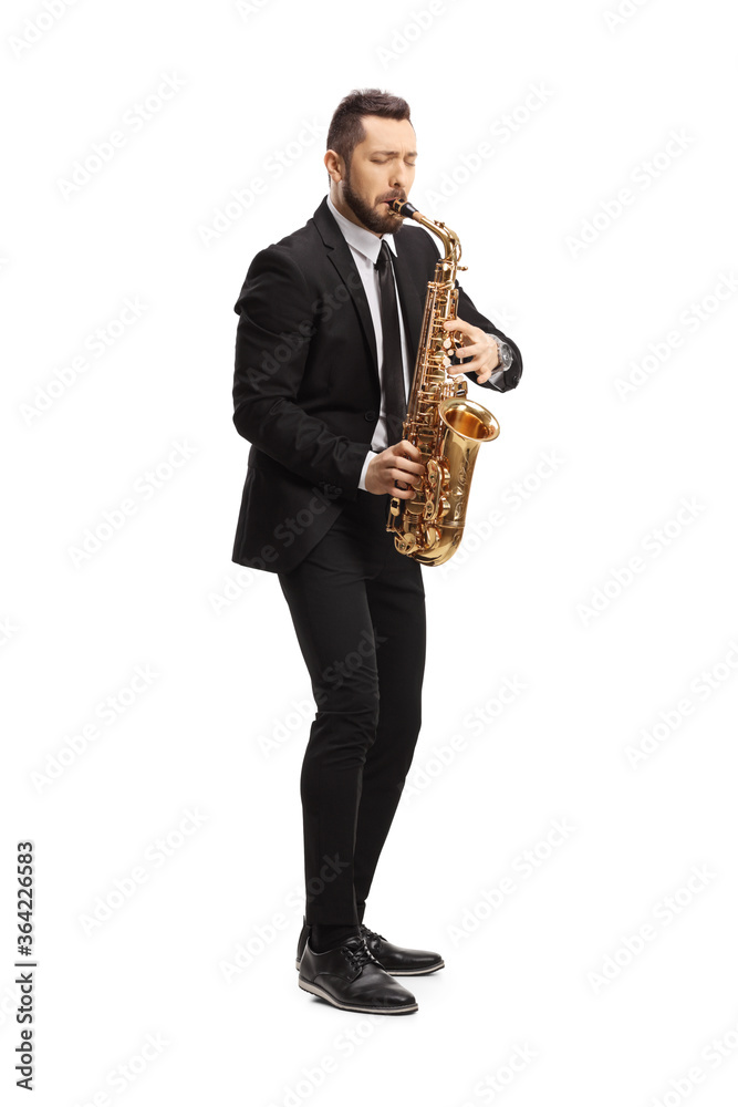 Naklejka premium Elegant man in a suit playing a saxophone