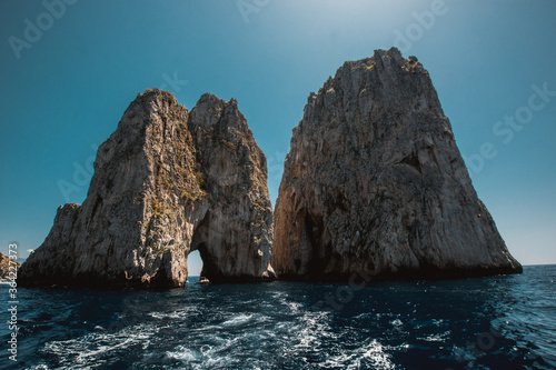 The two big rocks of the Capri's Faraglioni, Italian characteristic scenery. photo
