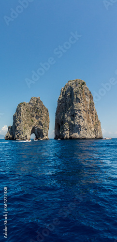 The majestic Faraglioni of the Capri Island.