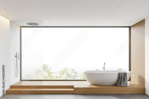 White and wooden bathroom with tub and shower