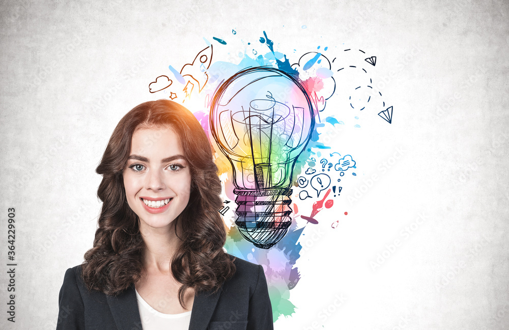 Smiling young woman and her business idea Smiling young woman and her business idea