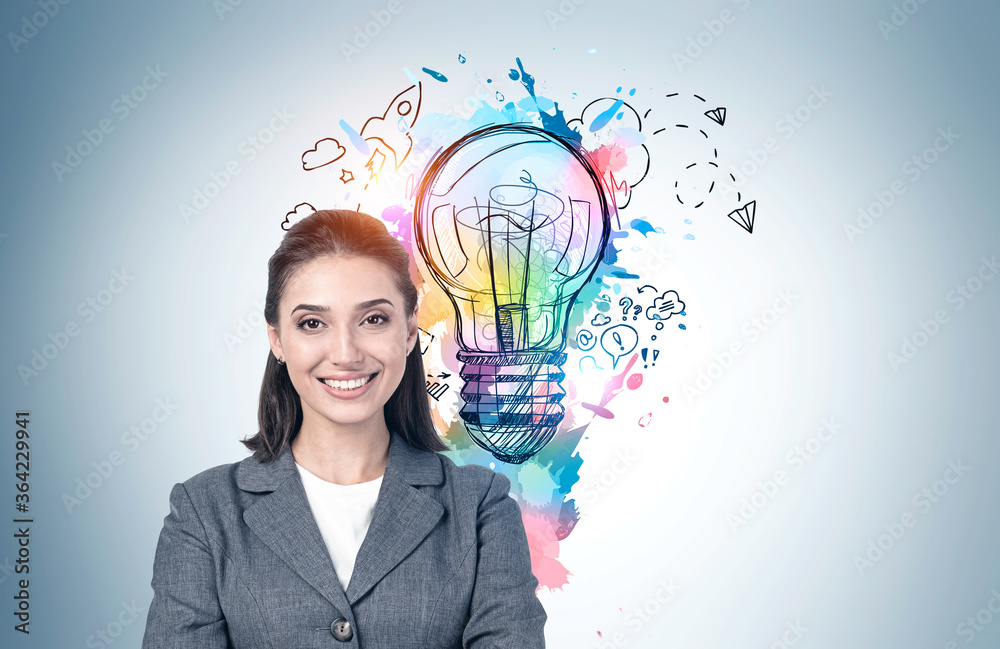 Smiling young woman and her business idea Smiling young woman and her business idea