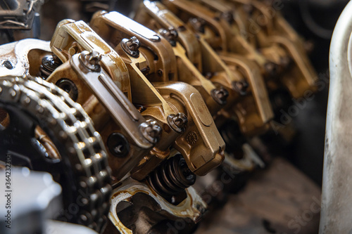 Close up Guide Valve Lifter and Camshaft engine of car.