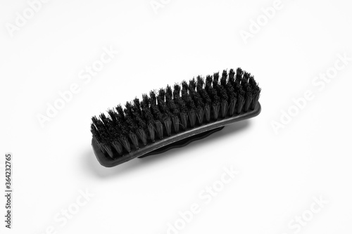 Clothes brush isolated on white background. High-resolution photo.