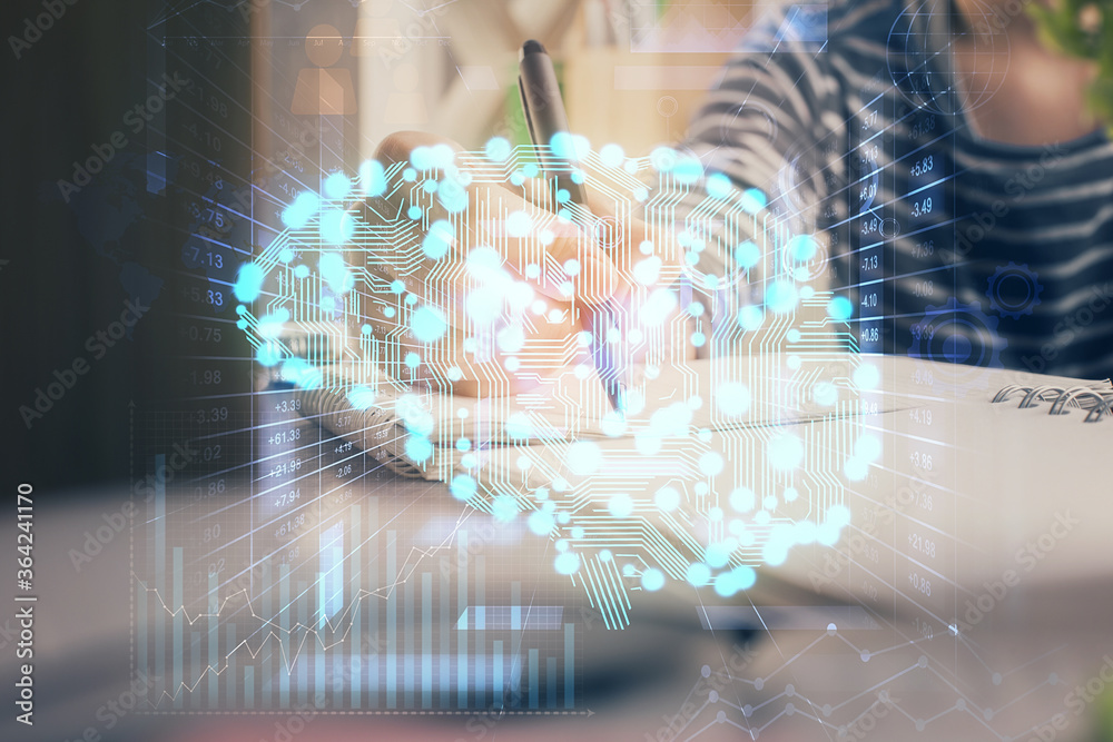 Multi exposure of writing hand on background with brain hologram. Concept of self learning. Multi exposure of writing hand on background with brain hologram. Concept of self learning.