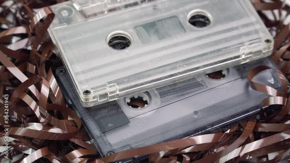 Old audiotape and audio cassettes. 80s concept. Set vintage background Old audiotape and audio cassettes. 80s concept. Set vintage background