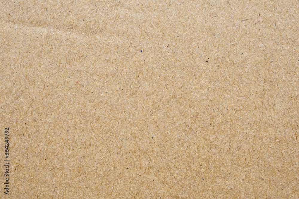 Fototapeta premium Brown eco recycled cardboard paper sheet texture background