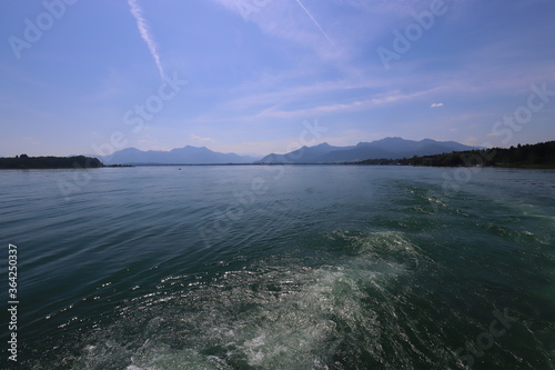 View on the bavarian lake Chiemsee with mountains in the backround