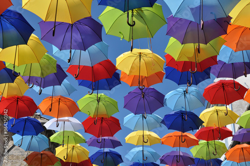 Colorful umbrellas in the sky. Street decoration. Colorful background.