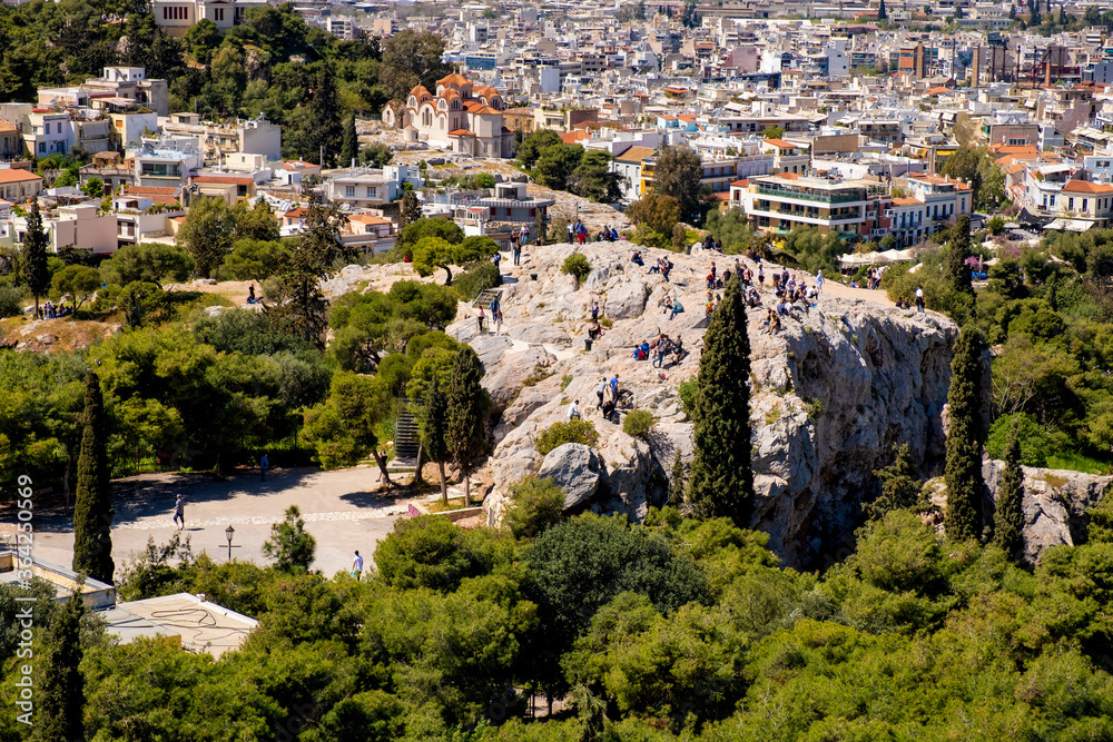 Panoramic view of Areopagus rock - Areios Pagos - seen from Acropolis hill with metropolitan Athens, Greece in background