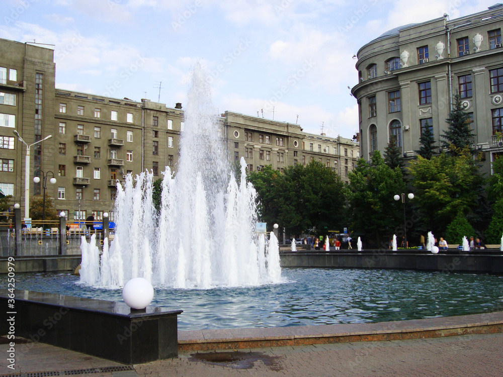 City fountain in the square, view