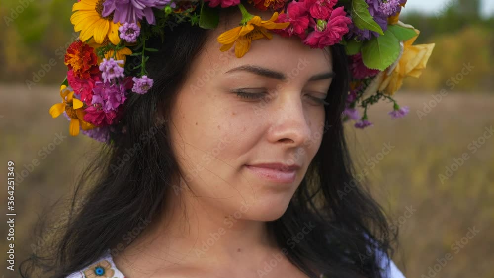 Beautiful Woman Opens Eyes and Finds out She Appeared in Field Dressed White Folk Dress Listening Musicians. Slow motion Beautiful Woman Opens Eyes and Finds out She Appeared in Field Dressed White Folk Dress Listening Musicians. Slow motion