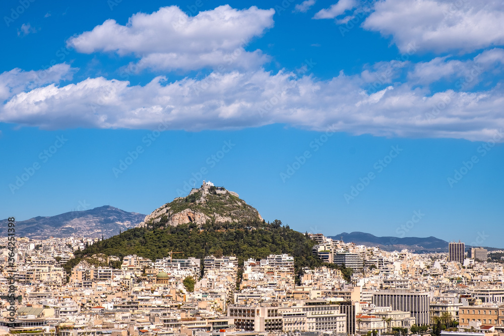 Panoramic view of metropolitan Athens, Greece with Lycabettus hill seen from rocky top of Acropolis hill