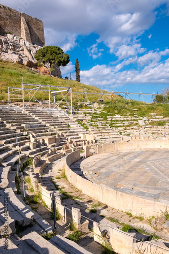 Panoramic view of Theatre of Dionysos Eleuthereus ancient Greek theater at slope of Acropolis hill in Athens, Greece photo