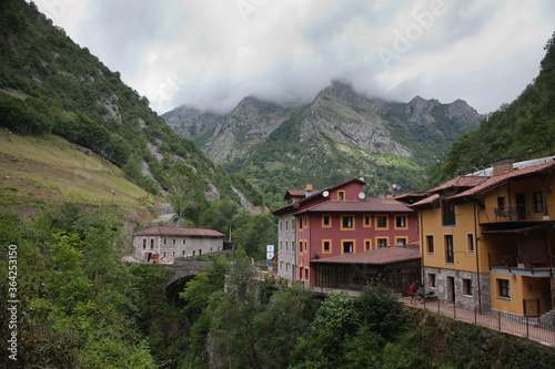 Settlement in the mountains of the Pyrenees on the banks of a fast mountain river.