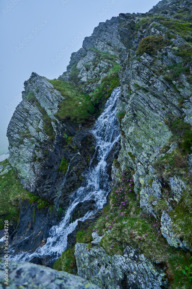 Waterfall in the mountains Waterfall in the mountains