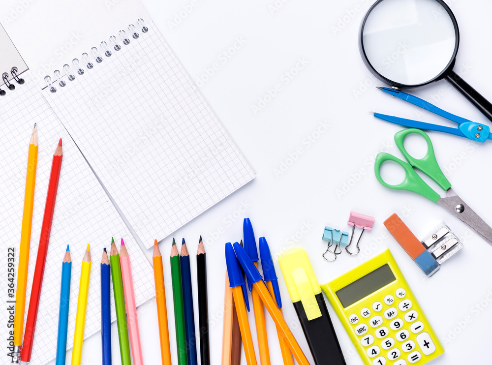 Many different school supplies on white copy space background. Back to school concept. Many different school supplies on white copy space background. Back to school concept.