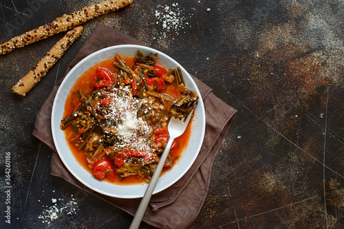 Quadro em tela Healthy Sauteed green cicory and tomatoes topped with caccioricotta cheese