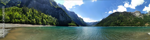 Fototapeta Naklejka Na Ścianę i Meble -  Swiss mountains and Lake. Scenic Alps and lane view. Trekking an
