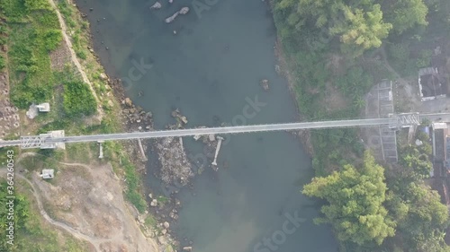 aerial view of the suspension bridge across the Opak river. Yogyakarta Indonesia photo