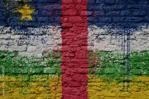 painted big national flag of central african republic on a massive old brick wall