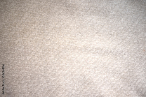 Beige cloth fabric texture for backdrop. Cloth background. Space for text. 