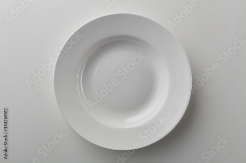 Top view shot of white circular plate.