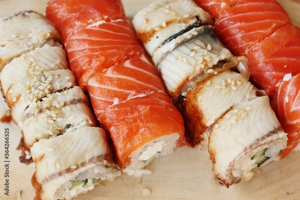 Delicious sushi with fish caviar and eel