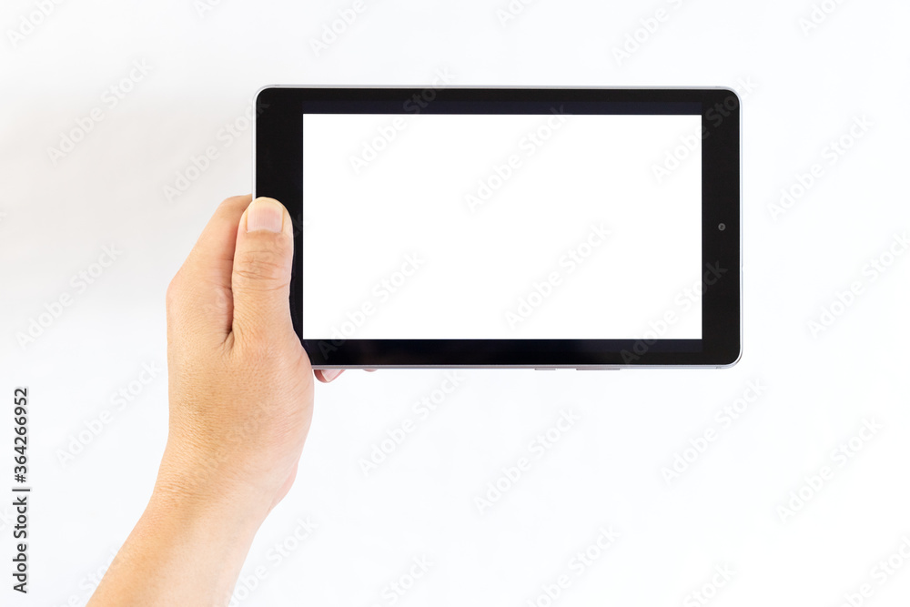 Left hand of a middle aged man holding a tablet computer in one hand. Left hand of a middle aged man holding a tablet computer in one hand.