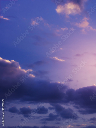 Dramatic sky background with purple clouds.