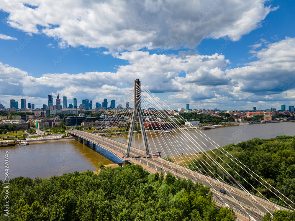 Warsaw skyline behind the bridge, Swietokrzyski bridge - obrazy, fototapety, plakaty 
