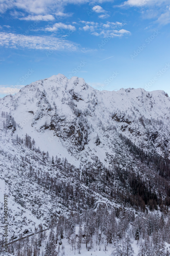 Vršič pass snow mountains road blue sky winter Slovenia